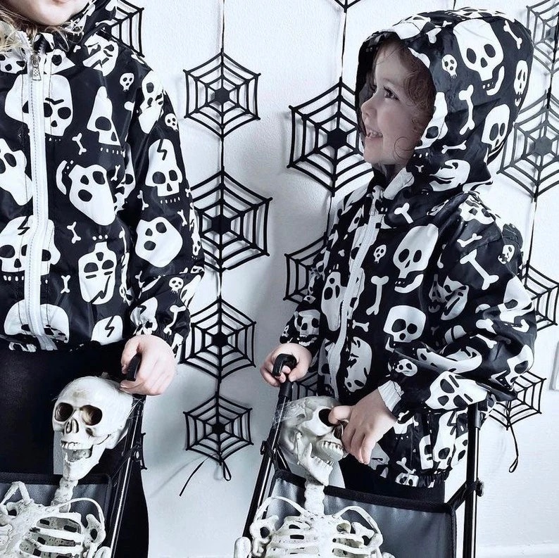 Metallimonsters Skull & Bone Raincoat at SugarSkulls Australia