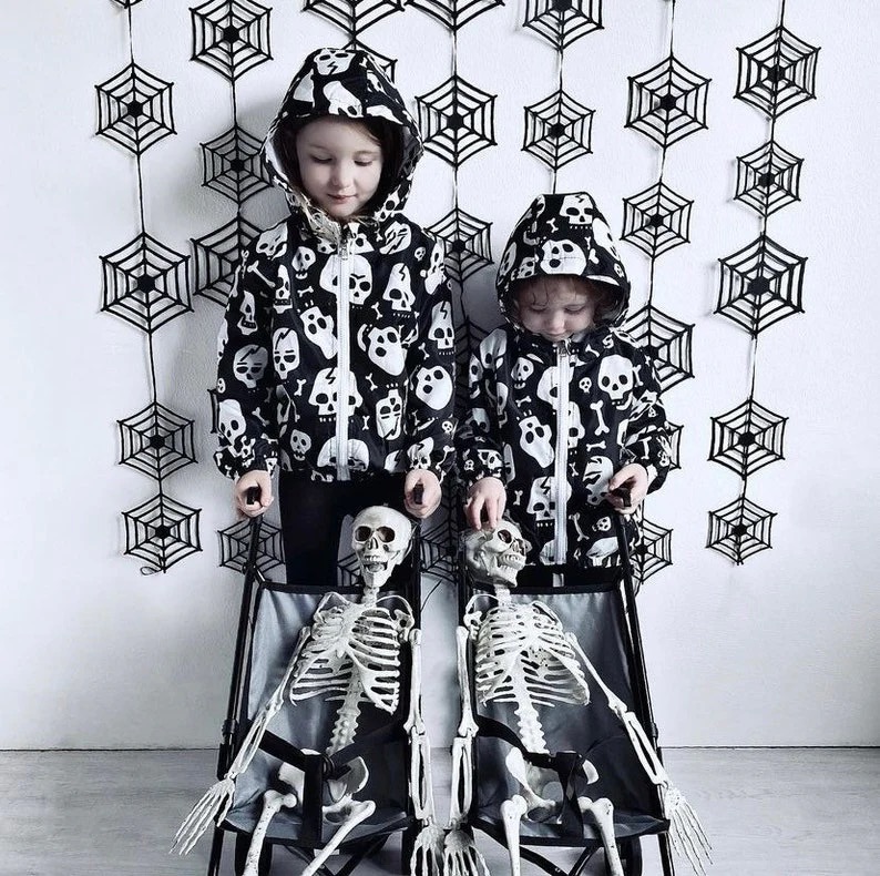 Metallimonsters Skull & Bone Raincoat at SugarSkulls Australia